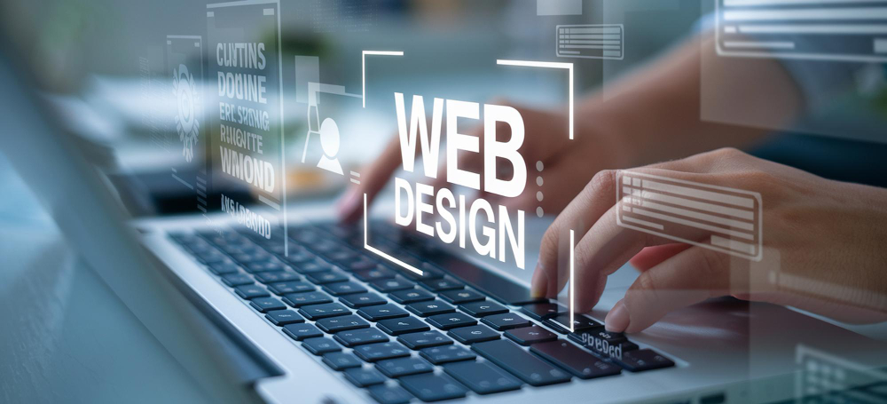 Laptop z napisem Web Design – tworzenie stron internetowych